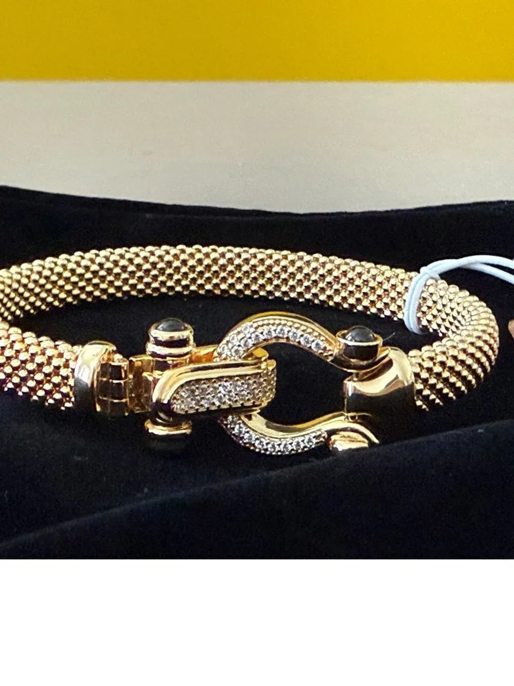 NWT Mia Fiore 18K Gold Plated Bronze horseshoe clasp with black spinel Bracelet